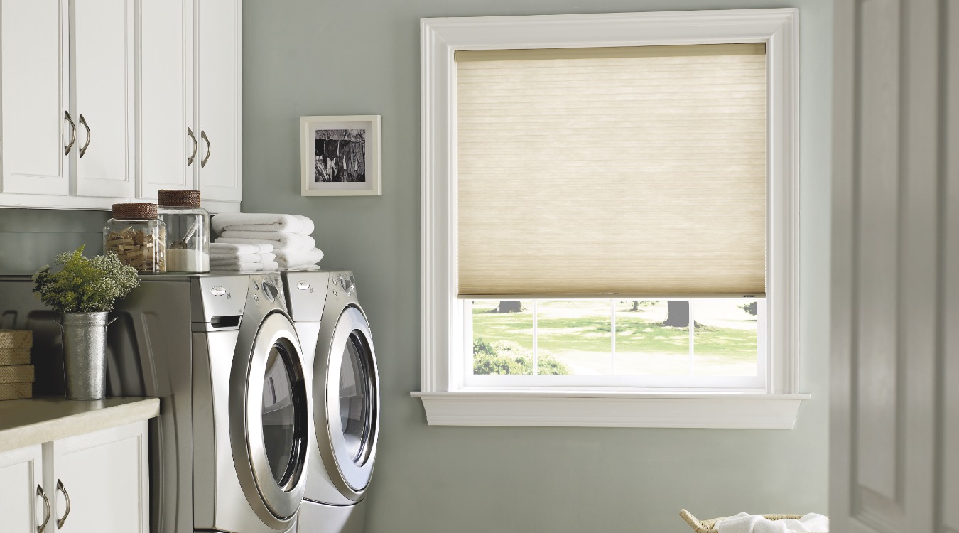 Laundry room with cell shades